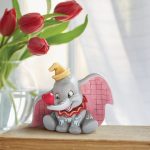 A Gift of Love (Dumbo with Heart Figurine)6011915"A Gift of Love" Holding a heart with his trunk, the lovable flying elephant, Dumbo disney traditions jim shore