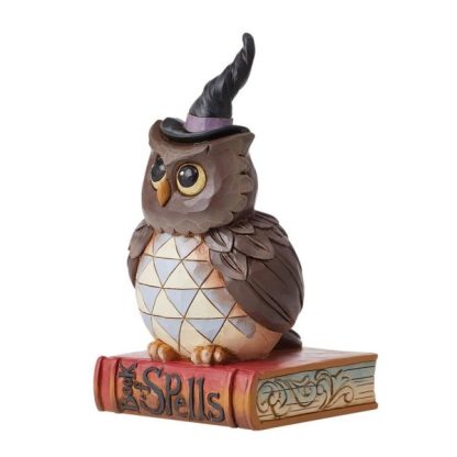 Owl Halloween Pint Figurine6012749"Halloween Hoot" Designed in the iconic style of Jim Shore, this Halloween owl perches on his spooky book of spells.  mocho búho