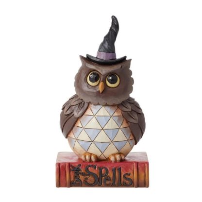 Owl Halloween Pint Figurine6012749"Halloween Hoot" Designed in the iconic style of Jim Shore, this Halloween owl perches on his spooky book of spells.  mocho búho